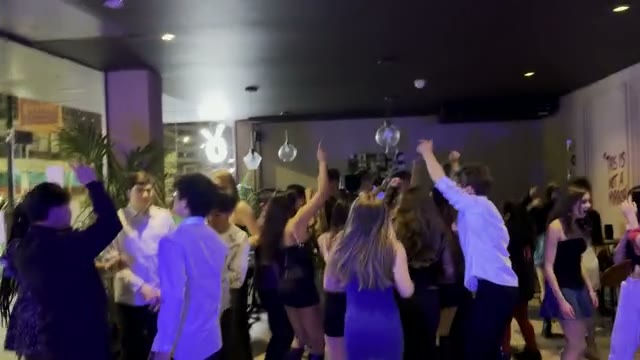 Club dancefloor during an open-format DJ set