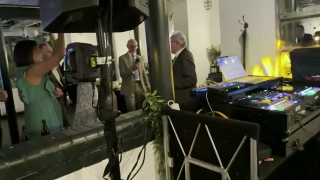 DJ Ozzy at a corporate event venue