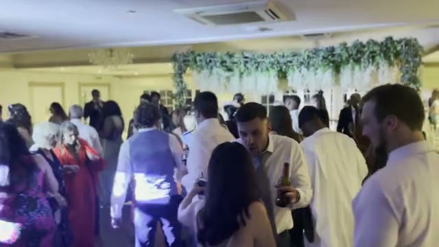 DJ Ozzy performing at a wedding celebration